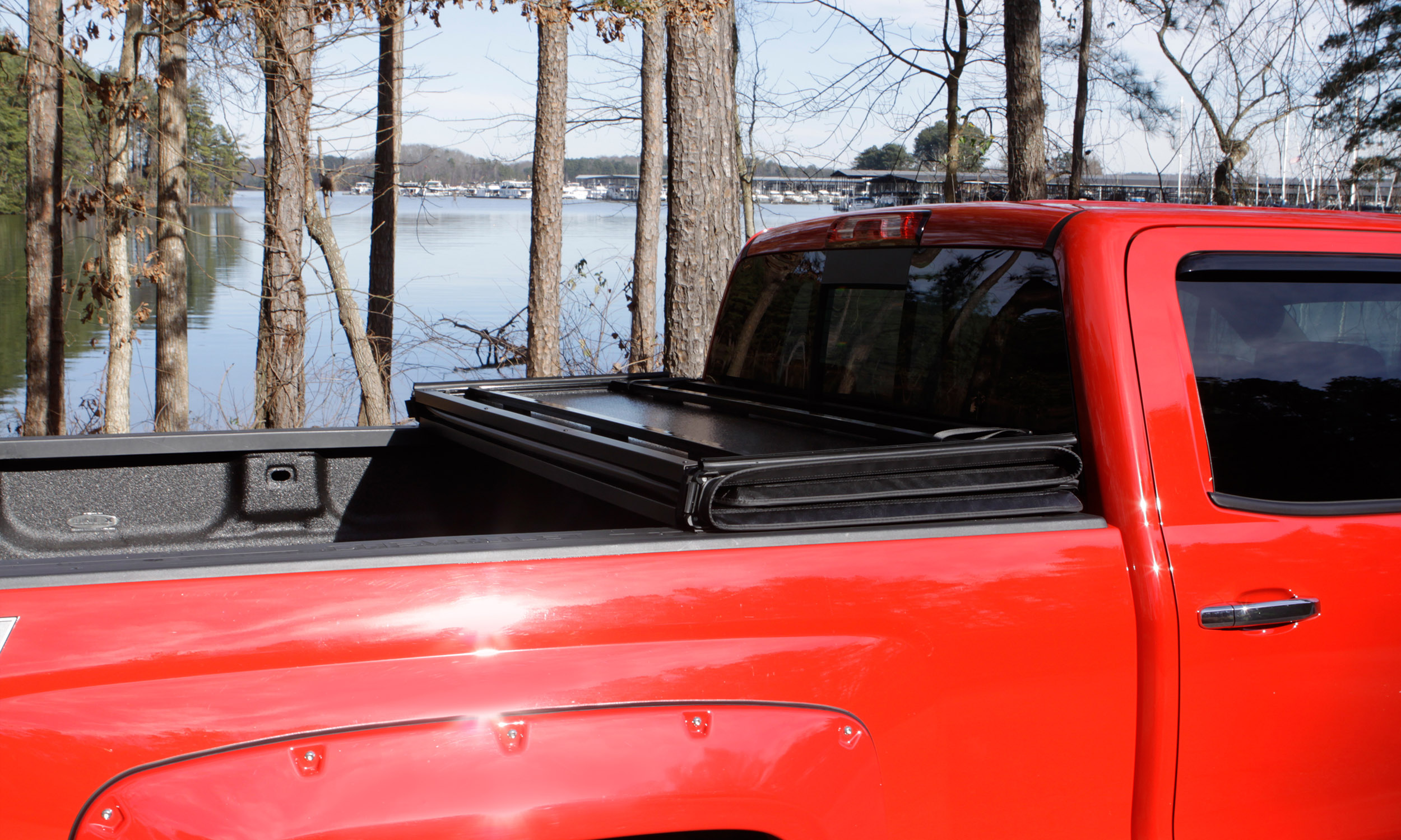 Lund 969151 - Genesis Hard Fold Tonneau Cover, 5'9" Bed, Black