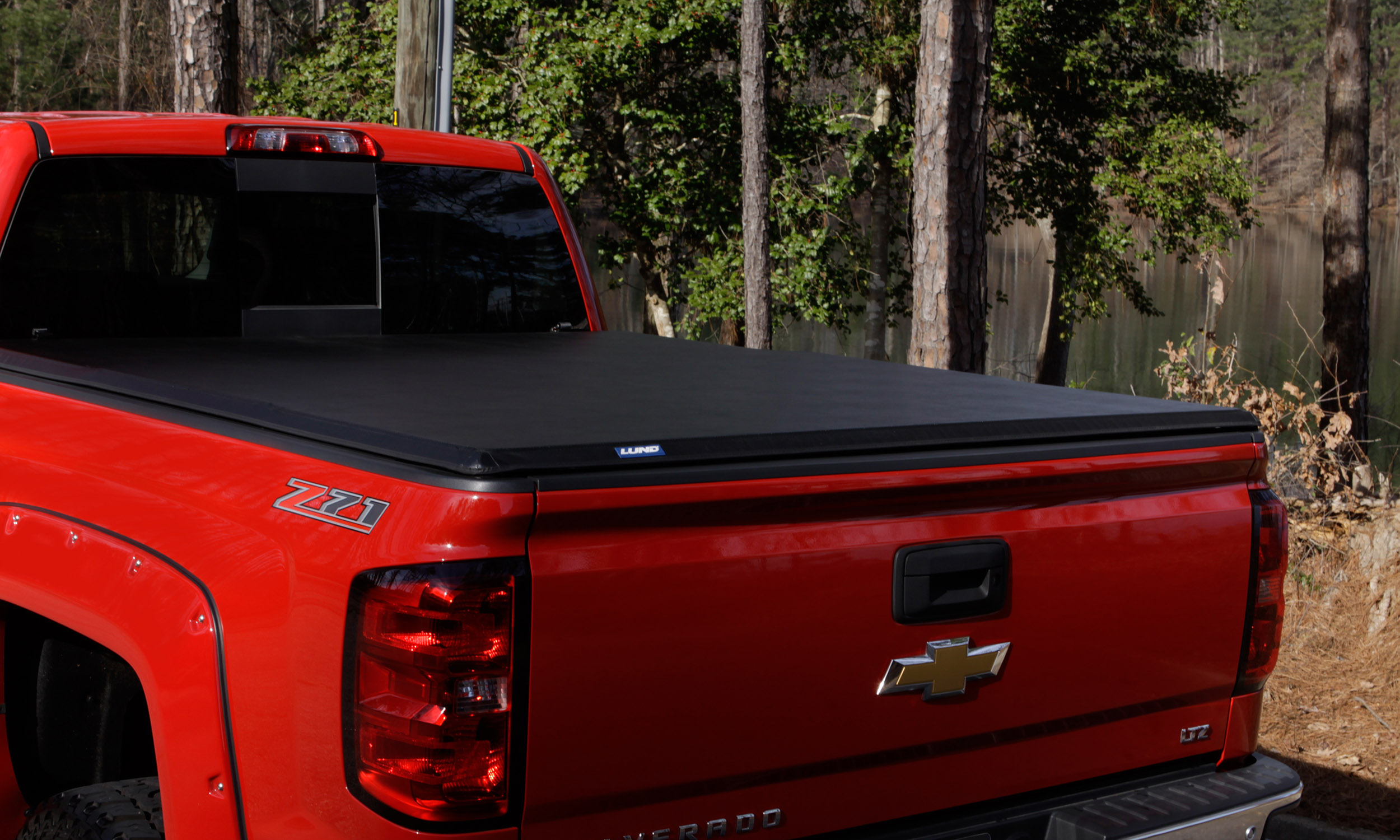 Lund 969151 - Genesis Hard Fold Tonneau Cover, 5'9" Bed, Black